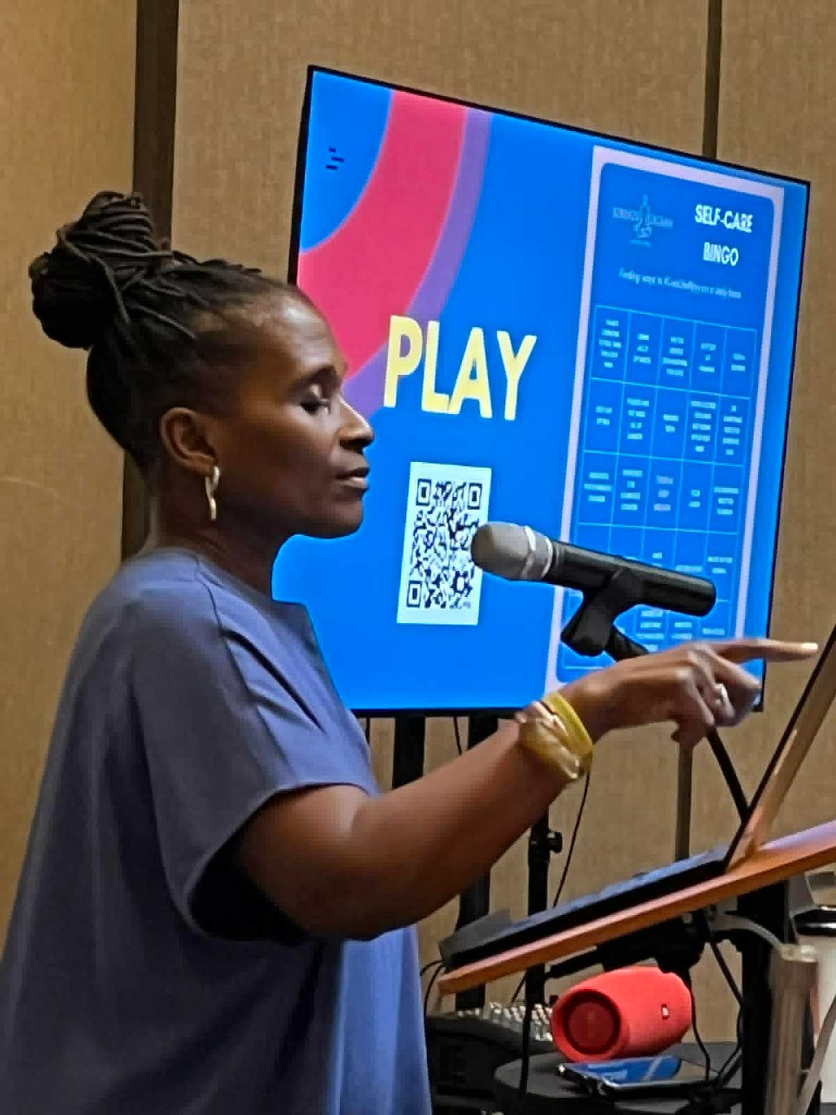 Dionne C.Monsanto presenting at StaarCon 2024.